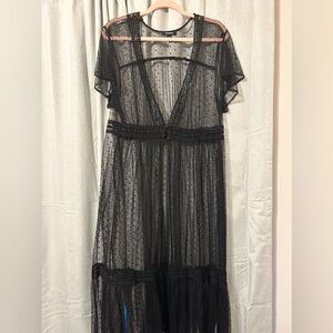 Black womens knee length tufts over shrug